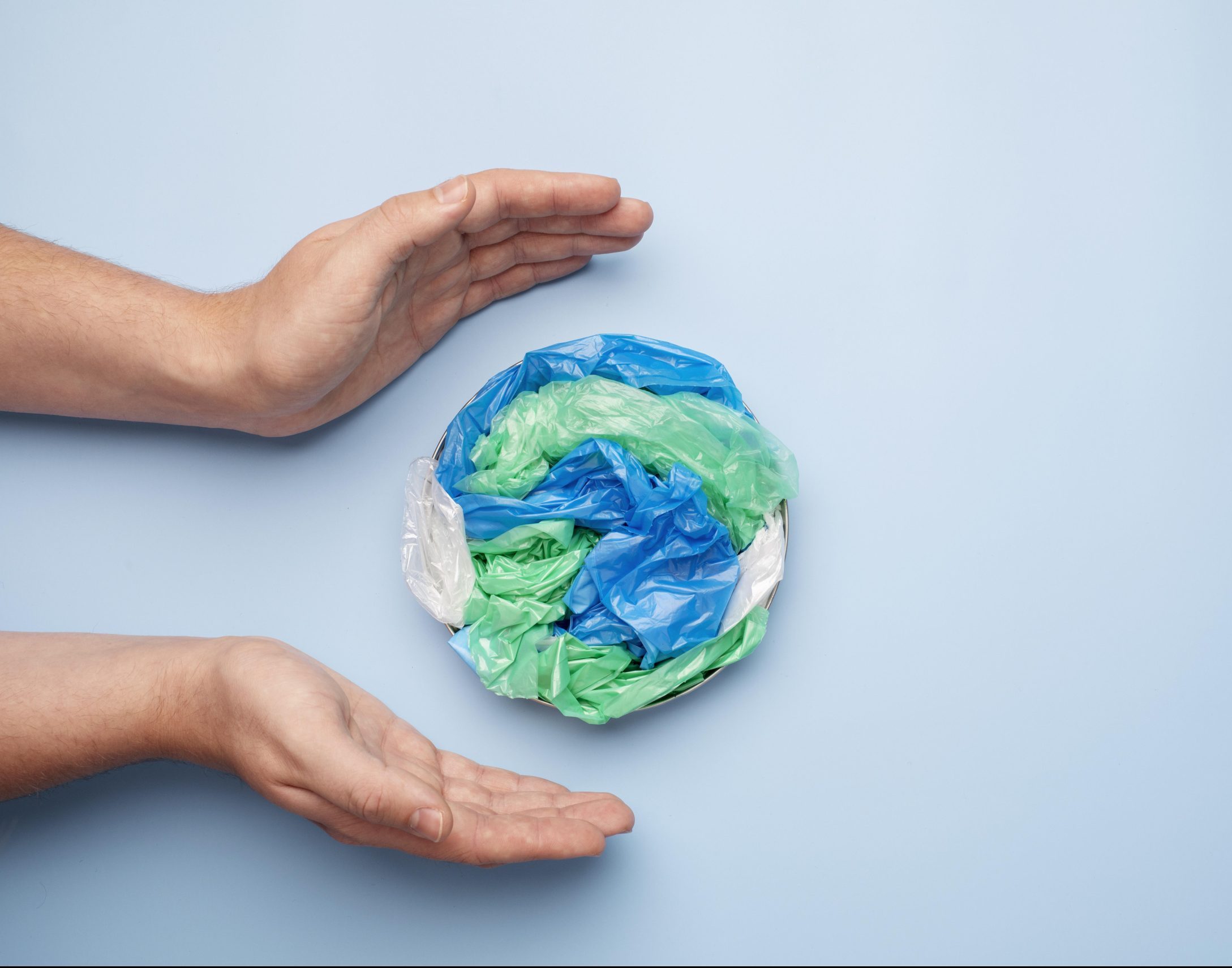 photo of hands with hand with plastic pa/pe earth