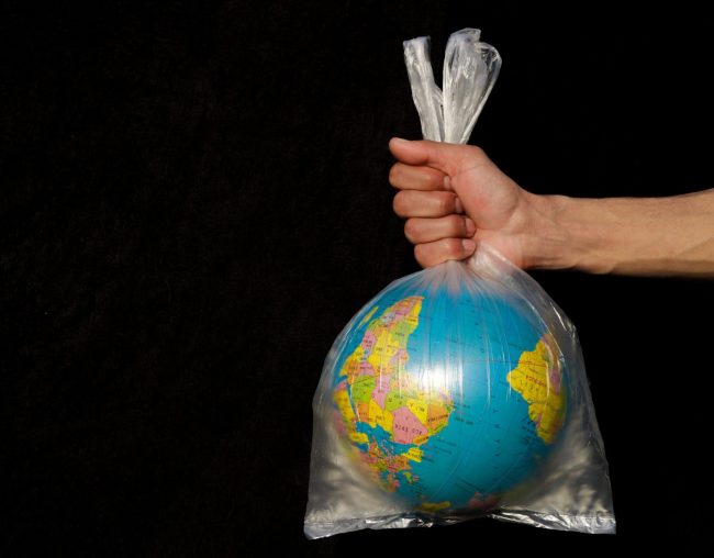 bag wrapped around globe - EU Signs Bridge to Busan Declaration to Control Plastic Production