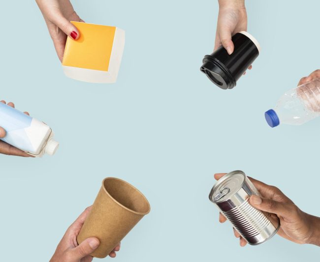 hands holding packaging -Recyclability Assessment Framework in the UK, Defra recycling guidelines