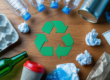 Recycling symbols and sustainable packaging materials illustrating the new EN 18120 standard for design for recycling compliance.