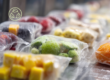 Fresh fruit and vegetable packaging utilizing biodegradable films, shown as a practical application of Chemical Migration Analysis findings for PBS and PLA blends.